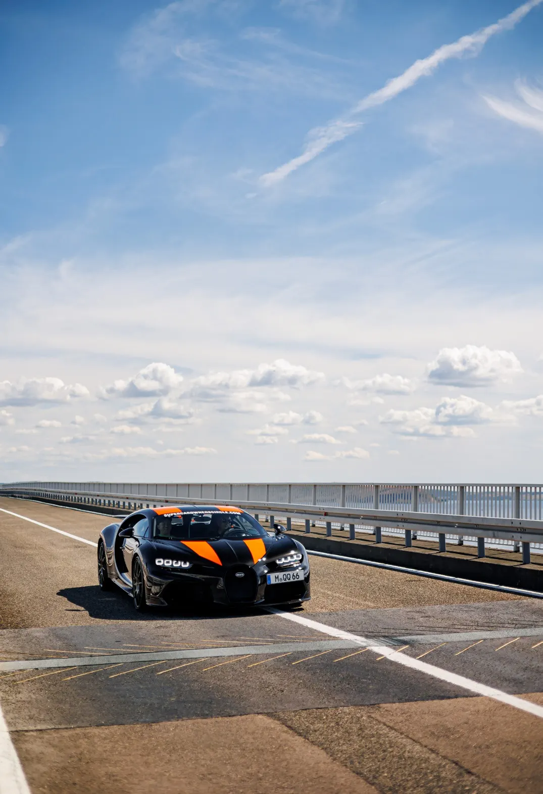 Performance car travelling on an open European road.