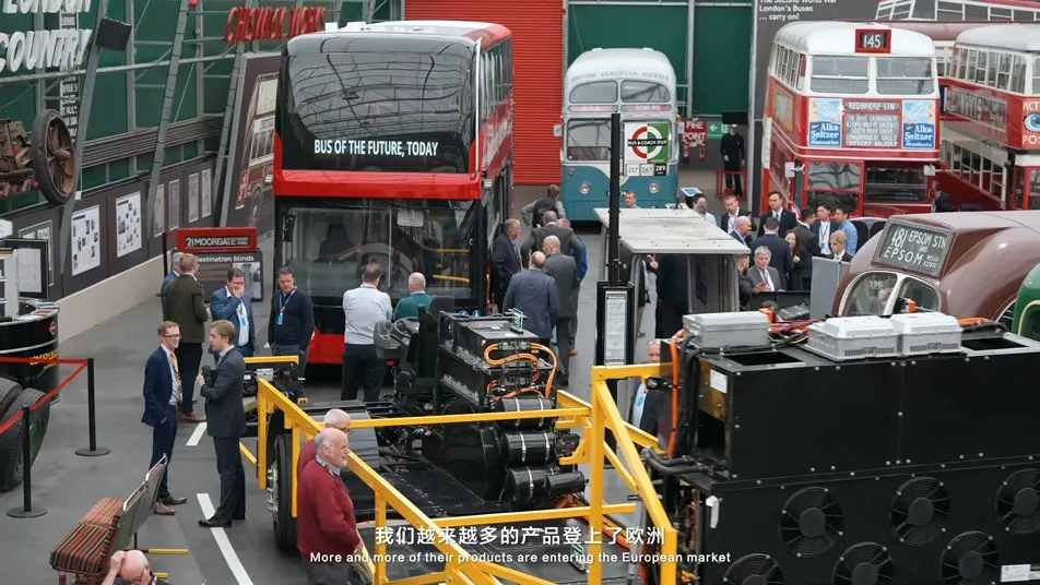Electric vehicle driving through a London street.