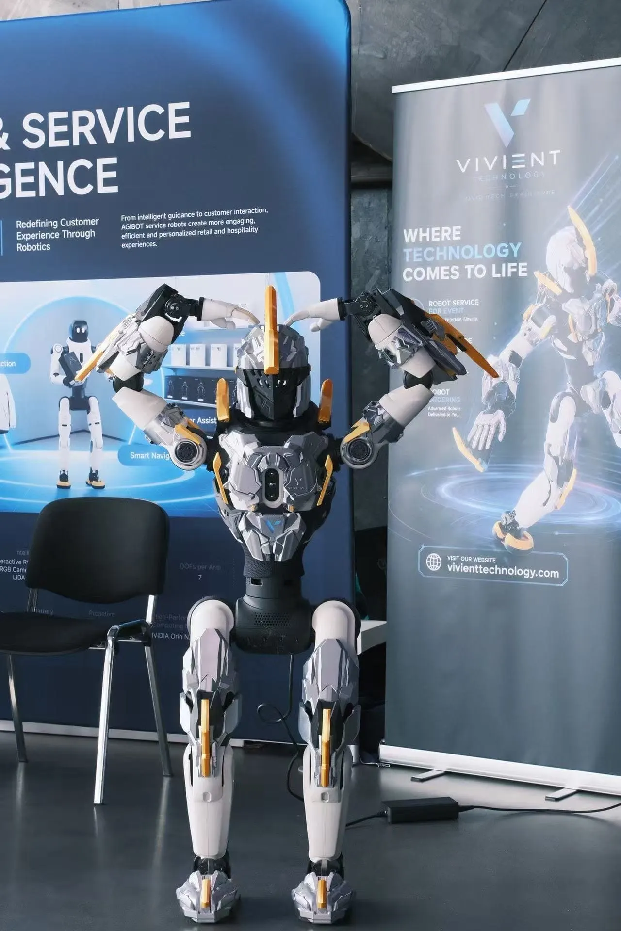 AGIBOT service robot demonstrated in the London display area.